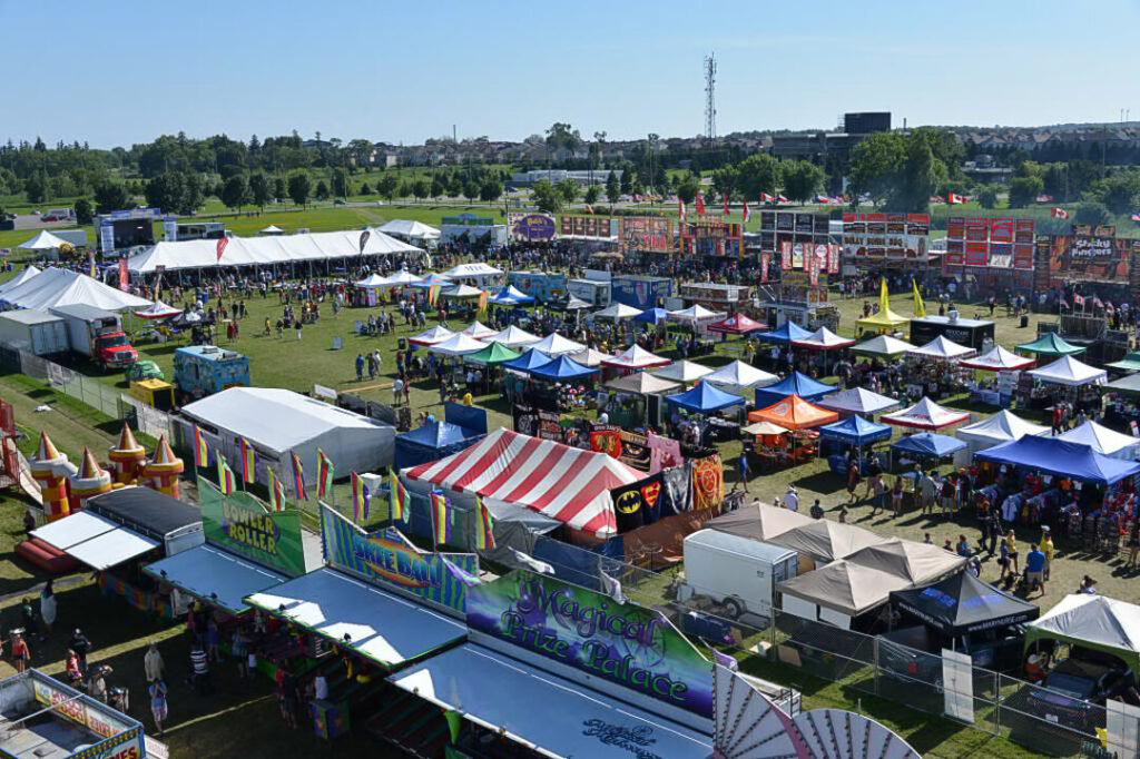 The Alabama Ribfest in Whitby, Ontario, filled with tents of vendors and sponsors to accommodate people