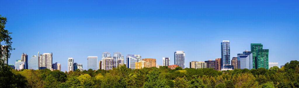 A view of North York, featuring its natural areas and building structures